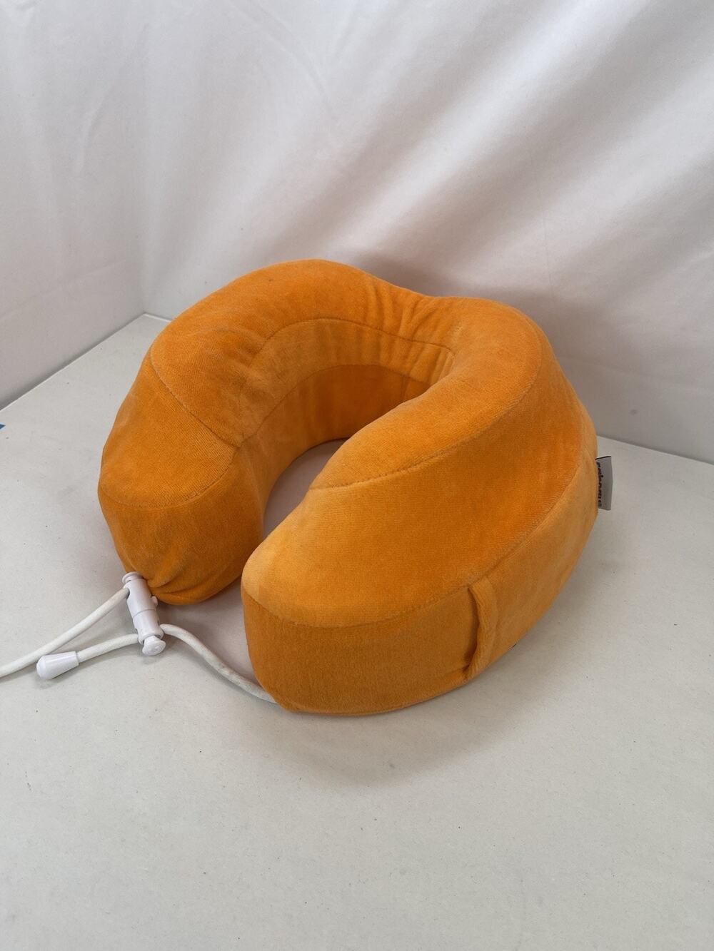 Cabeau Orange Soft Travel Neck Pillow – Adjustable Cord Velour
